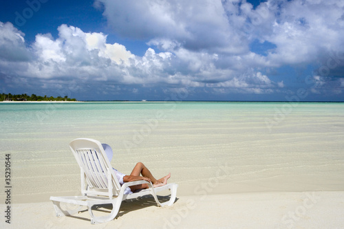 Middle-aged Woman Sitting in a Lounge   Maldives.