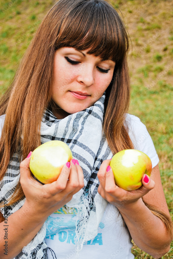 Girl with apples