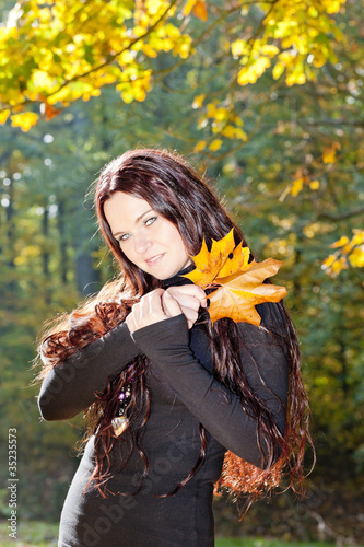 portrait of young woman in autumn