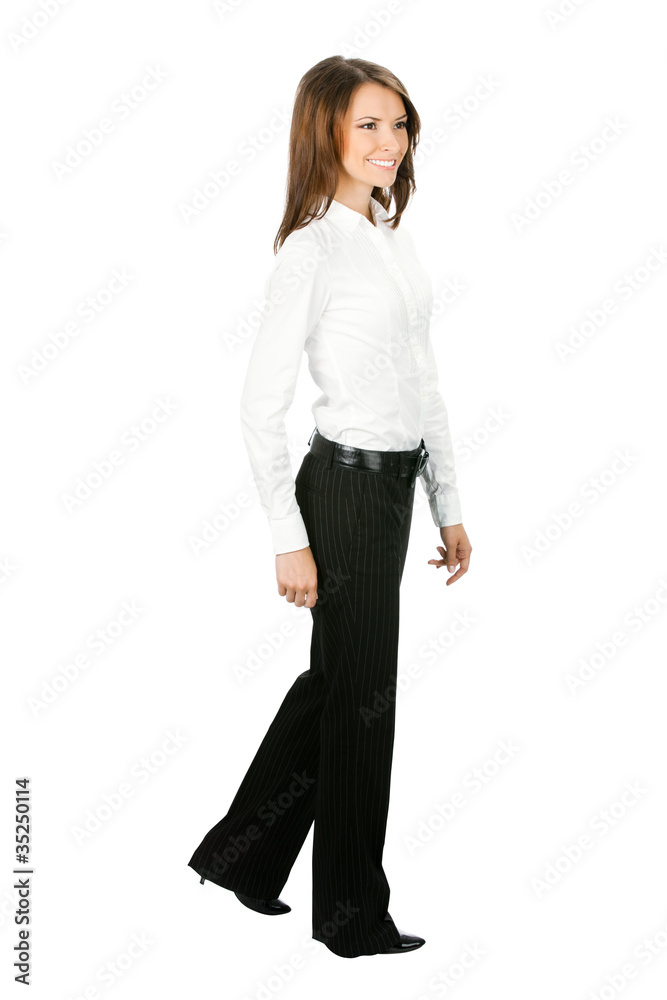 Full body portrait of walking business woman Full body portrait of walking business woman