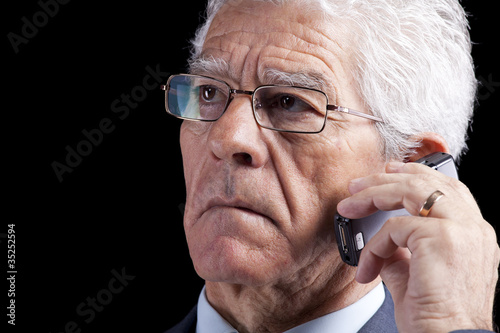 Senior Businessman talking at the cellphone