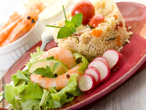 shrimp with salad and vegetables couscous