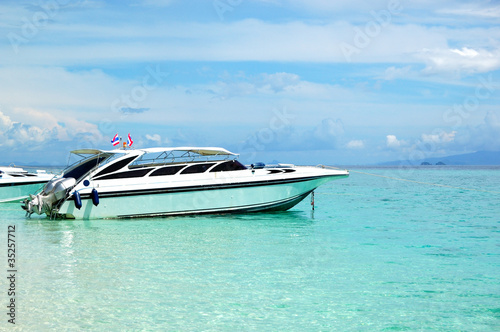 Motor boat on turquoise water of Indian Ocean, Phi Phi island, T © slava296