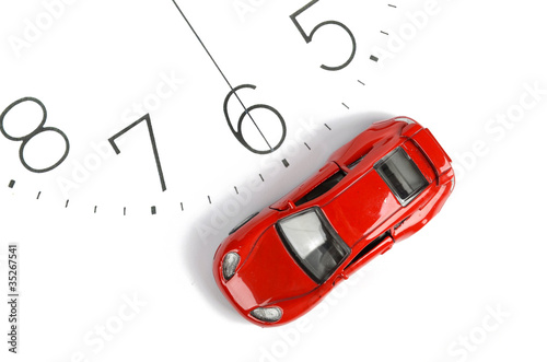 Toy car and clock face photo