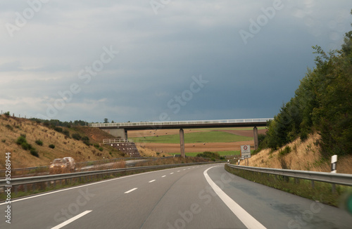 Almost deserted Autobahn under threatening skies