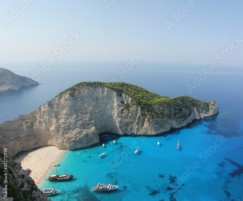 Top view of Navagio beach in Greece with cruisers