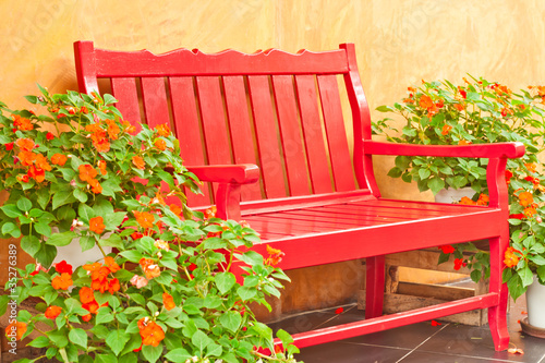 red color armchair in the garden