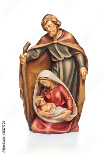 Weihnachtskrippe Holzfigur Josef und Maria mit Jesus im Arm photo