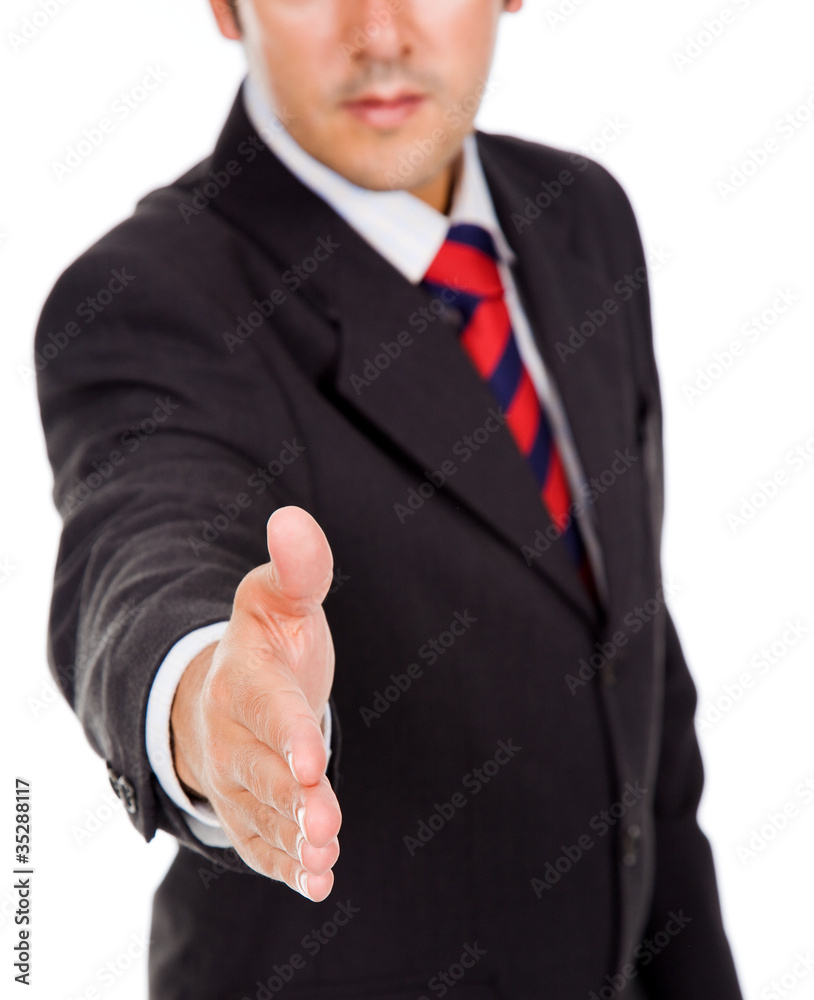 A business man with an open hand ready to seal a deal A business man with an open hand ready to seal a deal