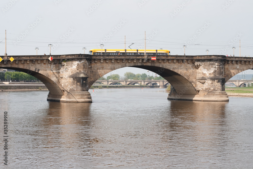 Fototapeta premium Tram on the bridge in Dresden
