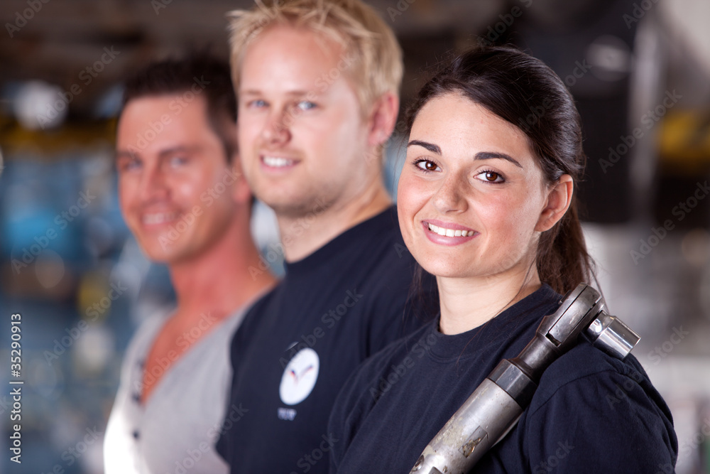 Obraz premium Mechanic Team with Woman