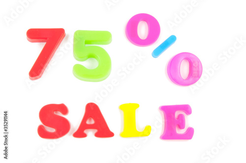 75  sale written in fridge magnets on white