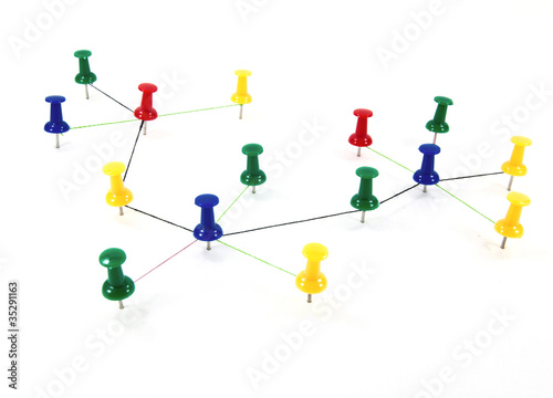 Push pins interconnected for network concept.