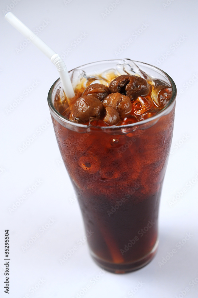 traditional thai drink,glass of ice Longan.and fresh flower on w traditional thai drink,glass of ice Longan.and fresh flower on w