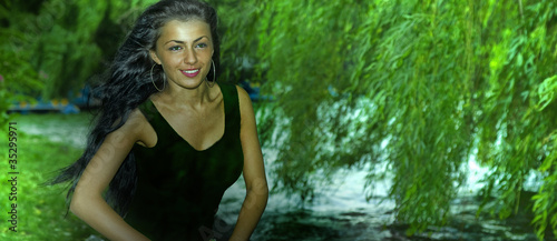 beautiful girl in green environment