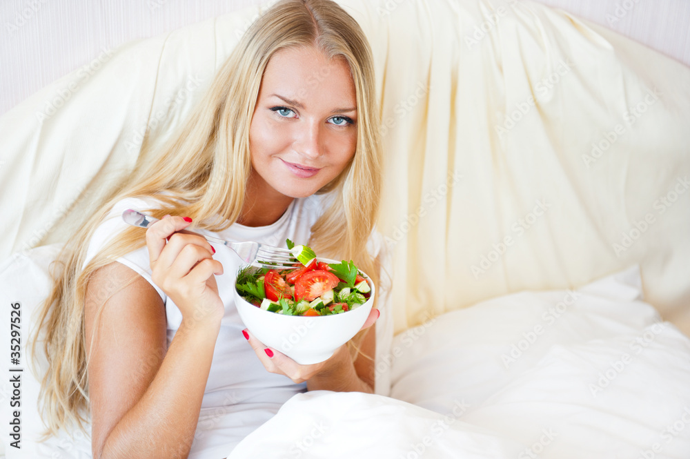 Closeup portrait of pretty caucasian woman having a healthy diet