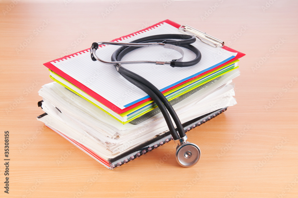 Medicine concept with stethoscope and books