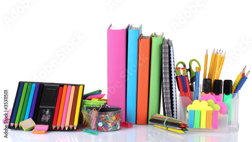 bright stationery and books isolated on white