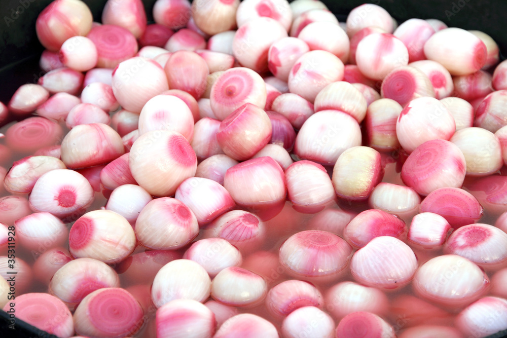 Pickled onions red spicy market food background Pickled onions red spicy market food background