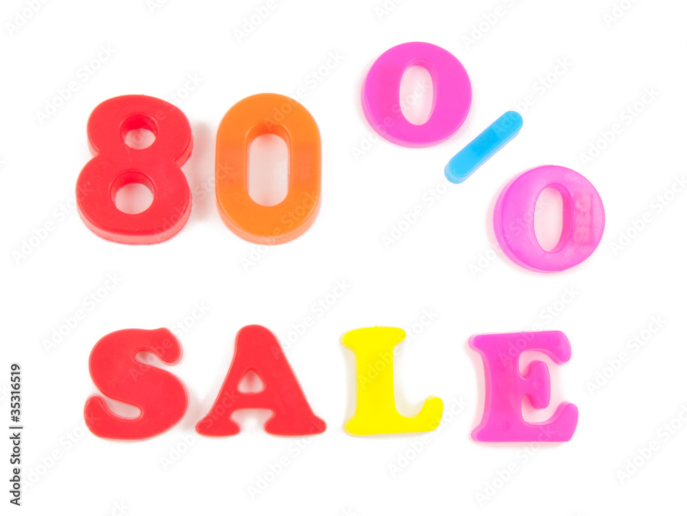 80% sale written in fridge magnets on white