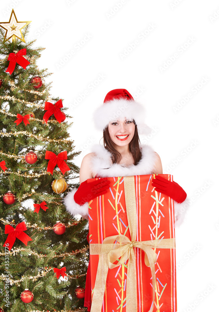 Christmas girl in santa holding gift box.