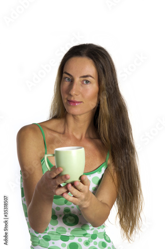 Beautiful woman with cup in hands