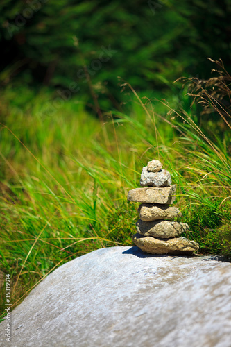 Small stone Zen tower on the rock