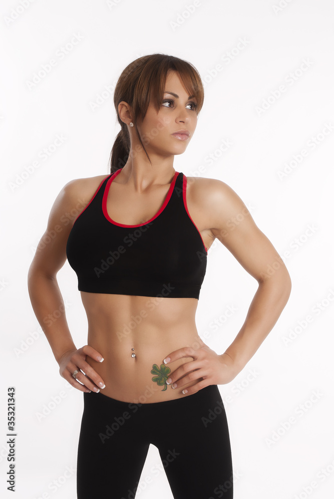 Healthy fit woman stands in her gym outfit Healthy fit woman stands in her gym outfit