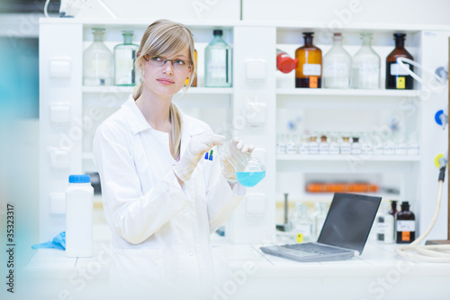 female researcher carrying out research in a lab