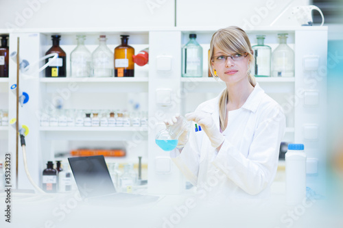 female researcher carrying out research in a lab