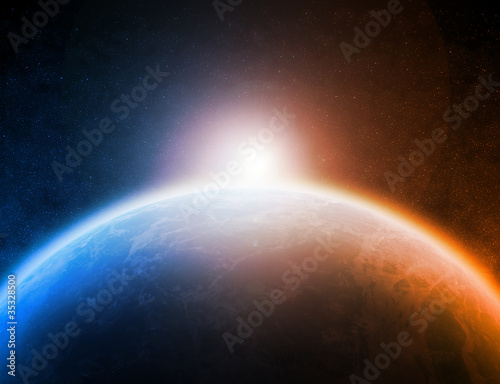 Fototapeta Naklejka Na Ścianę i Meble -  Sunrise over the Planet Earth