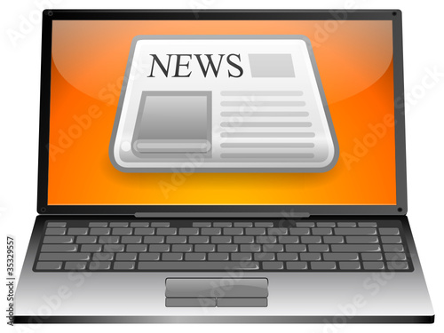 Laptop mit Zeitung
