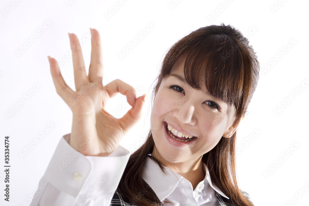 Beautiful business woman showing okay sign Beautiful business woman showing okay sign