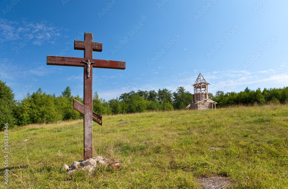 Cross in honor of the basis of church and under orthodox church