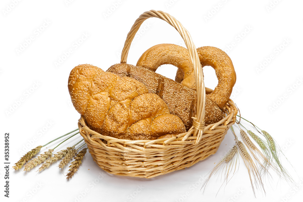 Basket with bread on white background Basket with bread on white background
