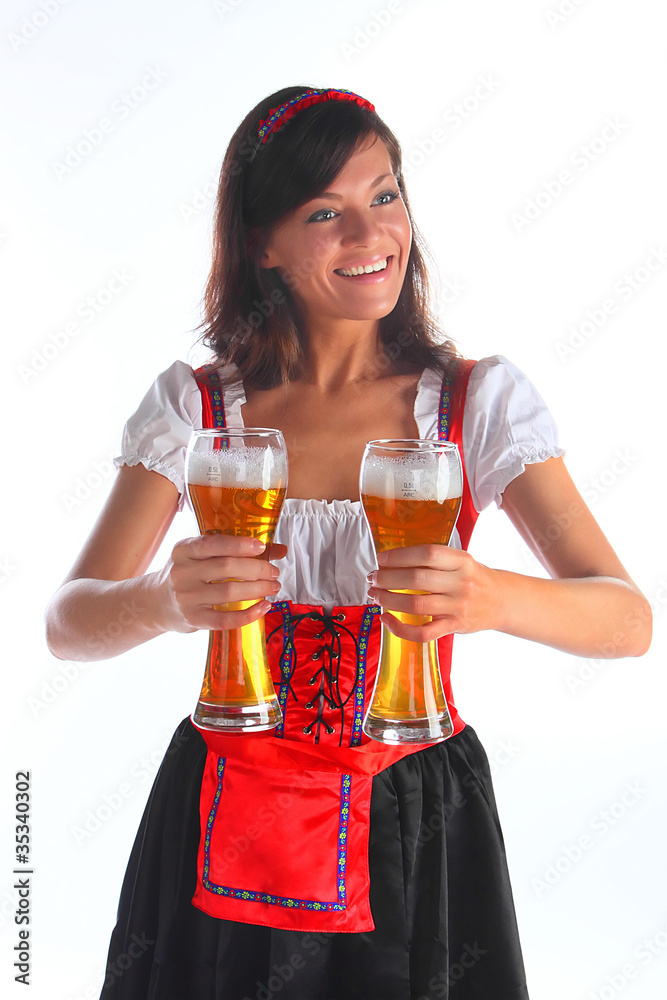 The girl in a traditional Bavarian dress The girl in a traditional Bavarian dress