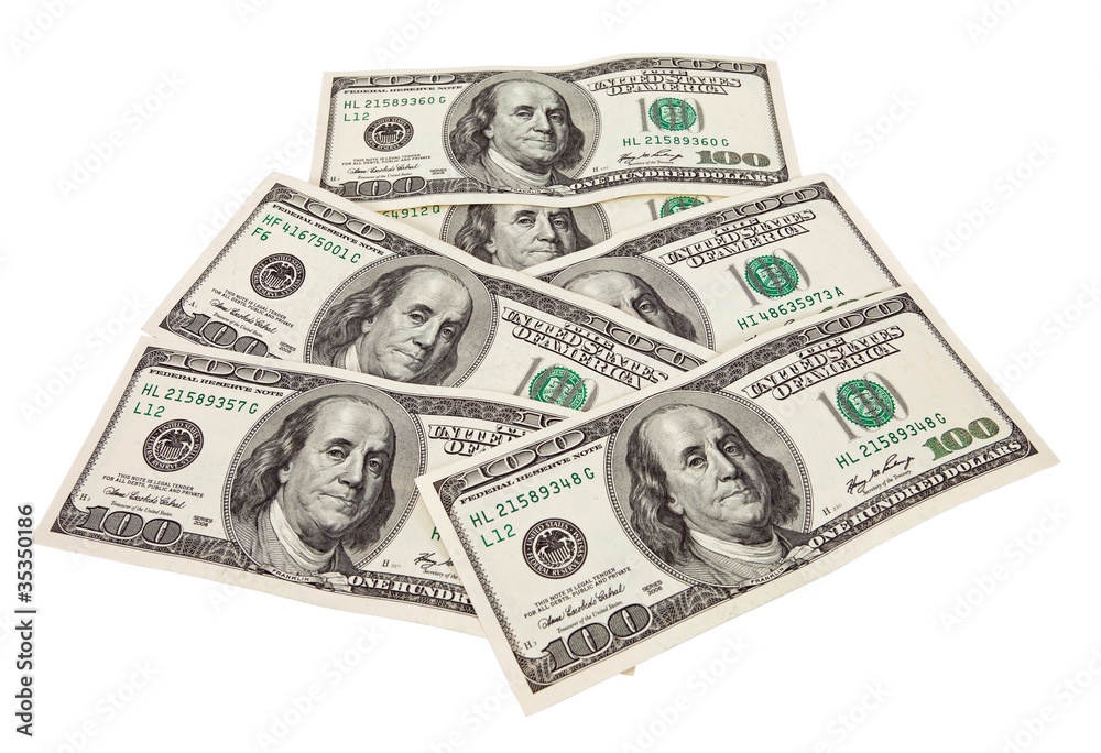 US dollars bills isolated on white background US dollars bills isolated on white background