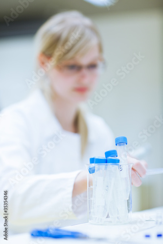 Fototapeta Naklejka Na Ścianę i Meble -  Closeup of a female researcher carrying out research experiments