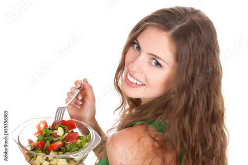 Portrait of young smile beautiful woman eating vegetable salad