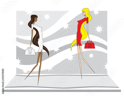 supermodels walking at a fashion show