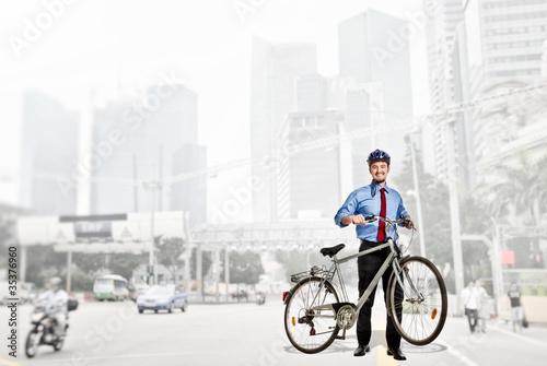businessman with bicycle © tiero