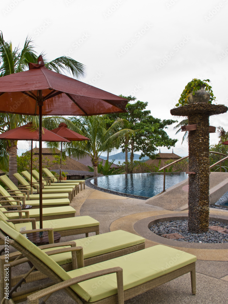 beach chairs and  umbrella