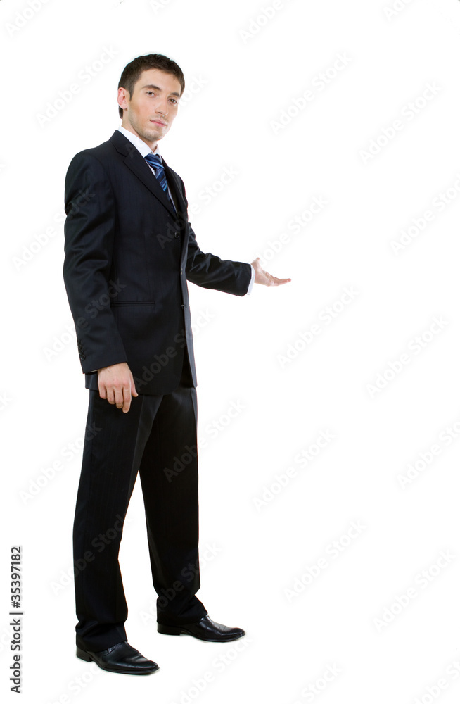 Businessman with arm out in a welcoming gesture Businessman with arm out in a welcoming gesture