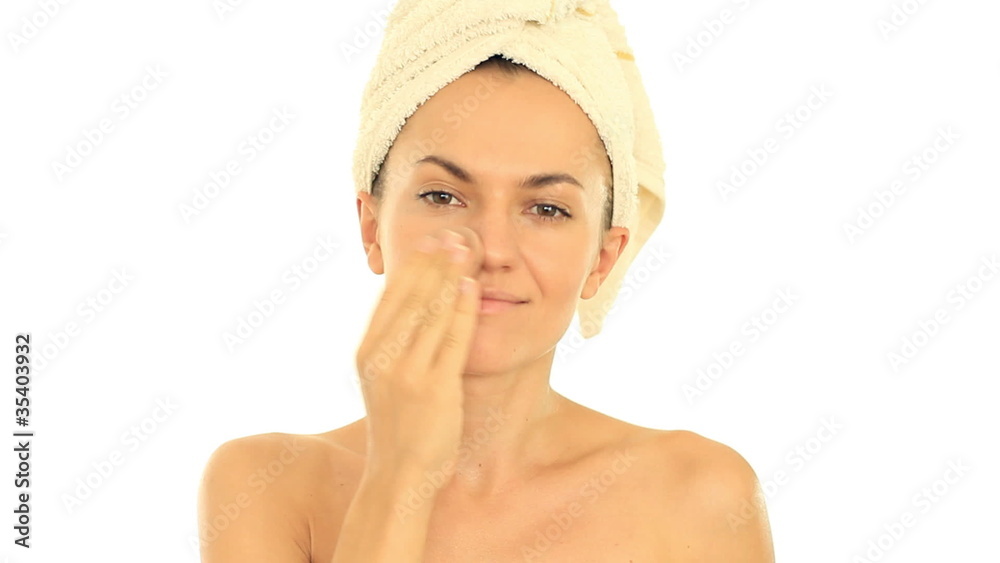 Beautiful young woman applying natural beauty make-up Beautiful young woman applying natural beauty make-up