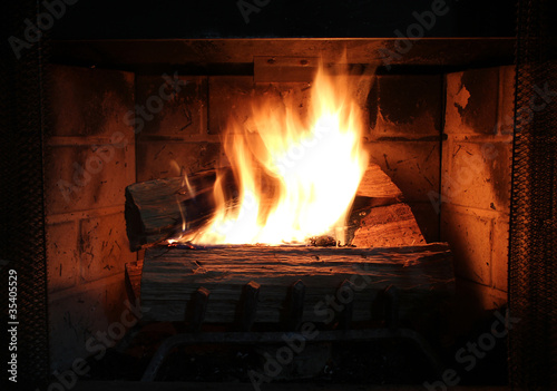 Burning wood in a fire place