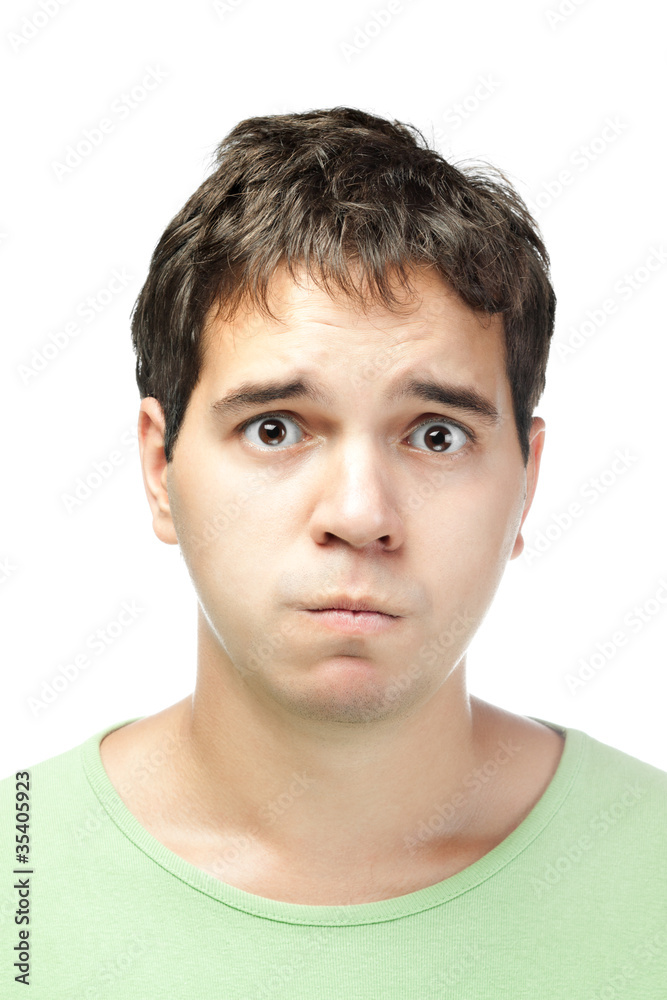 portrait of pitiful young man isolated on white background portrait of pitiful young man isolated on white background