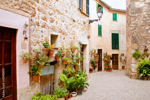 Majorca Valldemossa typical with flower pots in facade photo