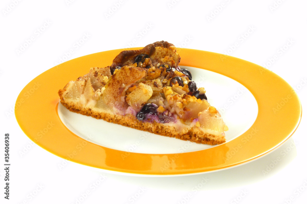 Birnen-Traubenkuchen auf Teller Birnen-Traubenkuchen auf Teller