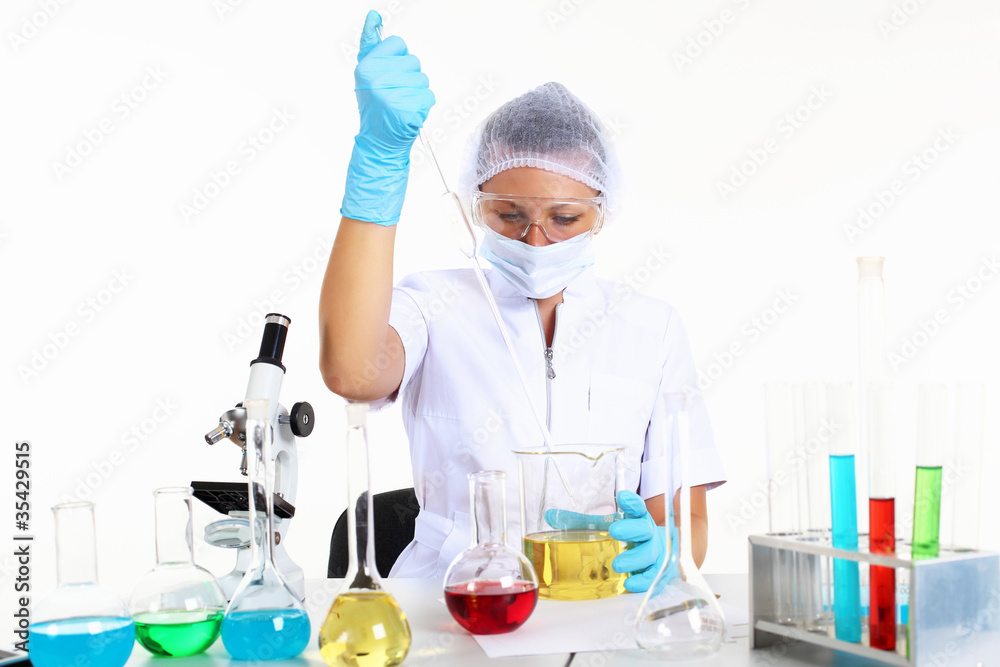 Female scientist in a chemistry laboratory Female scientist in a chemistry laboratory