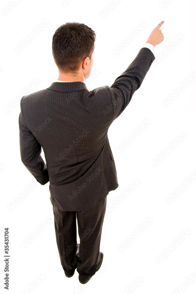 Successful young business man pointing at something interesting Successful young business man pointing at something interesting